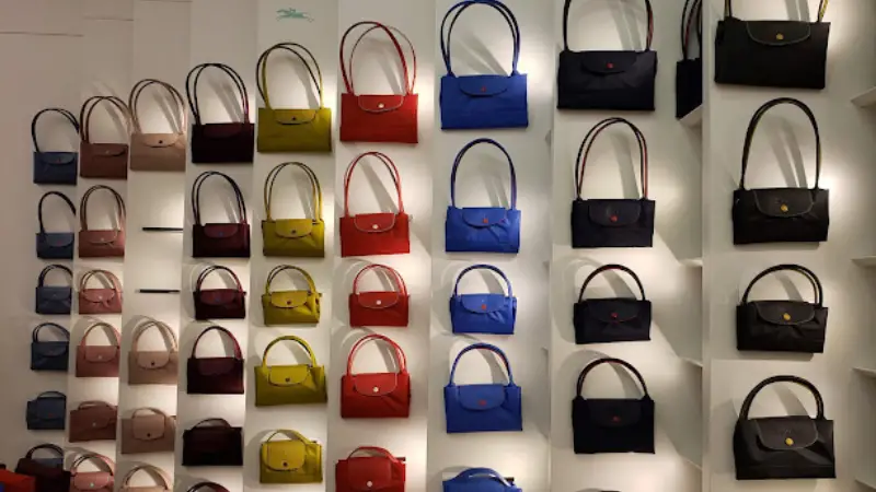 Bags in the showcase in Longchamp store in Boston, MA